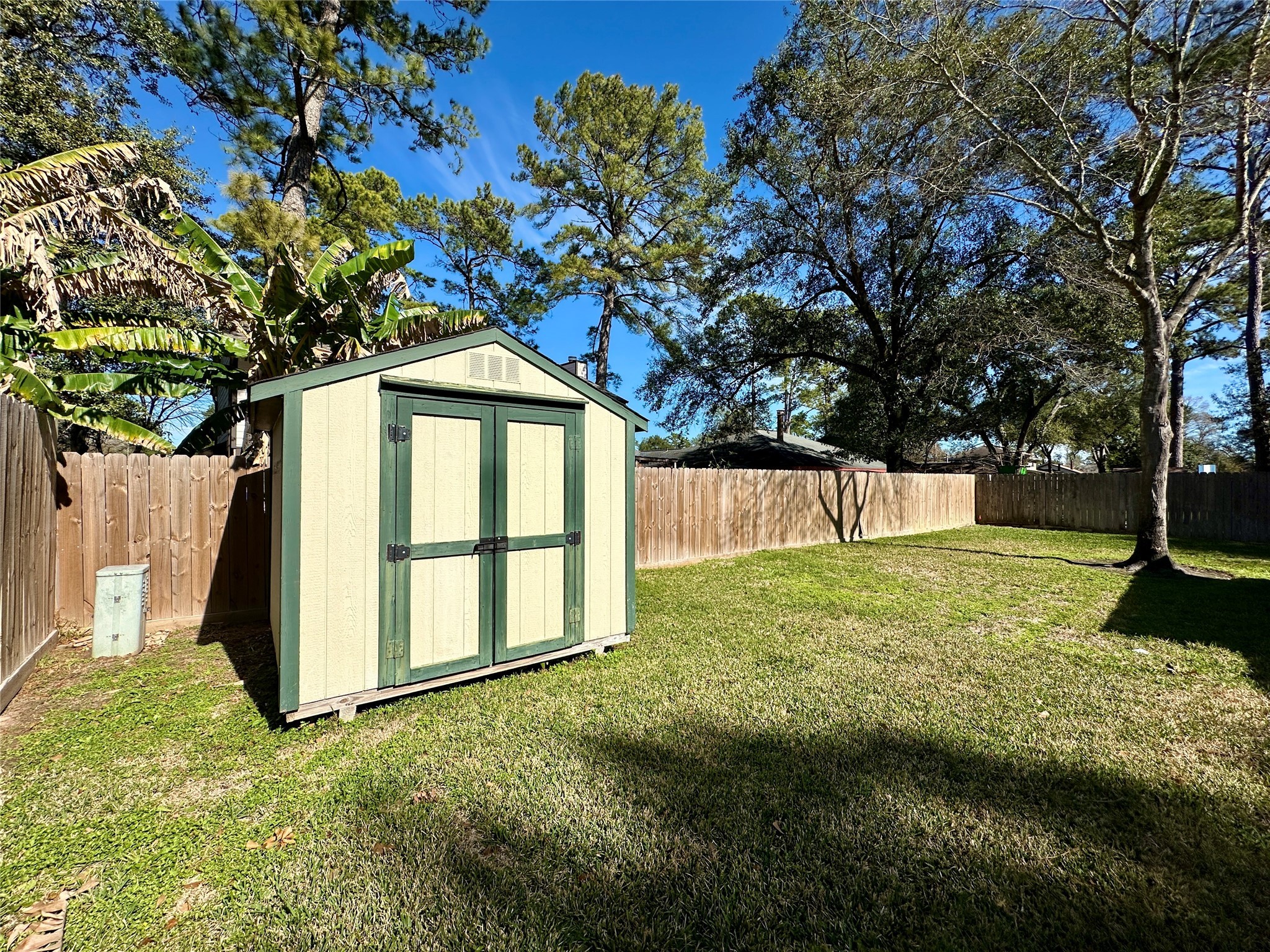 13402 Nevermore Drive Cypress, TX 77429 - Photo 30 of 33 a backyard of a house with lots of green space