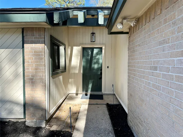 a view of a glass door of the house
