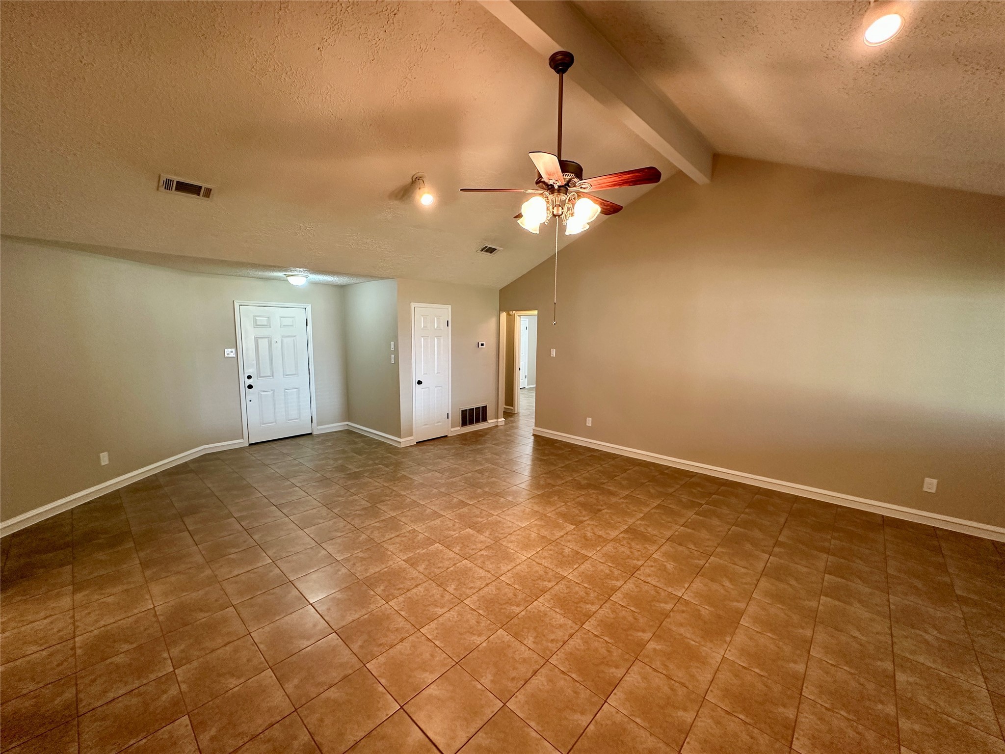 13402 Nevermore Drive Cypress, TX 77429 - Photo 8 of 33 a view of a livingroom with a chandelier fan and kitchen view