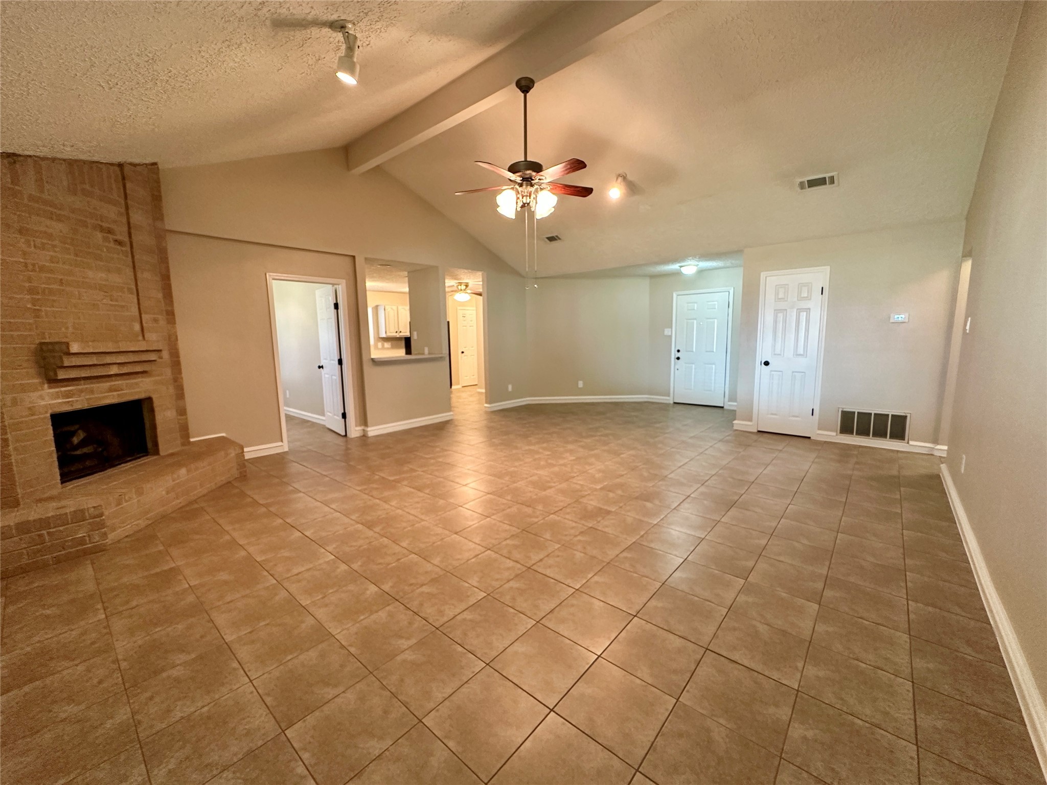 13402 Nevermore Drive Cypress, TX 77429 - Photo 9 of 33 wooden floor in an empty room with a fireplace