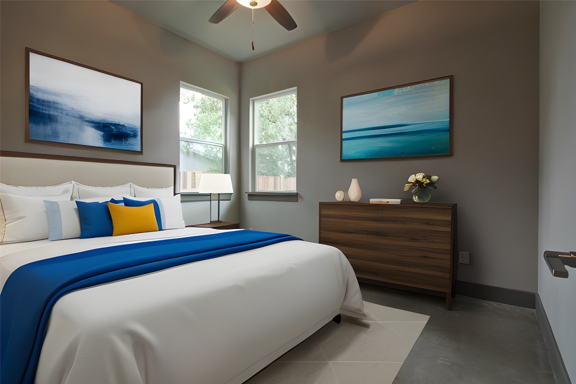 923 East 37th Street Austin, TX 78705 - Photo 4 of 36 a bedroom with a bed and a painting on the wall