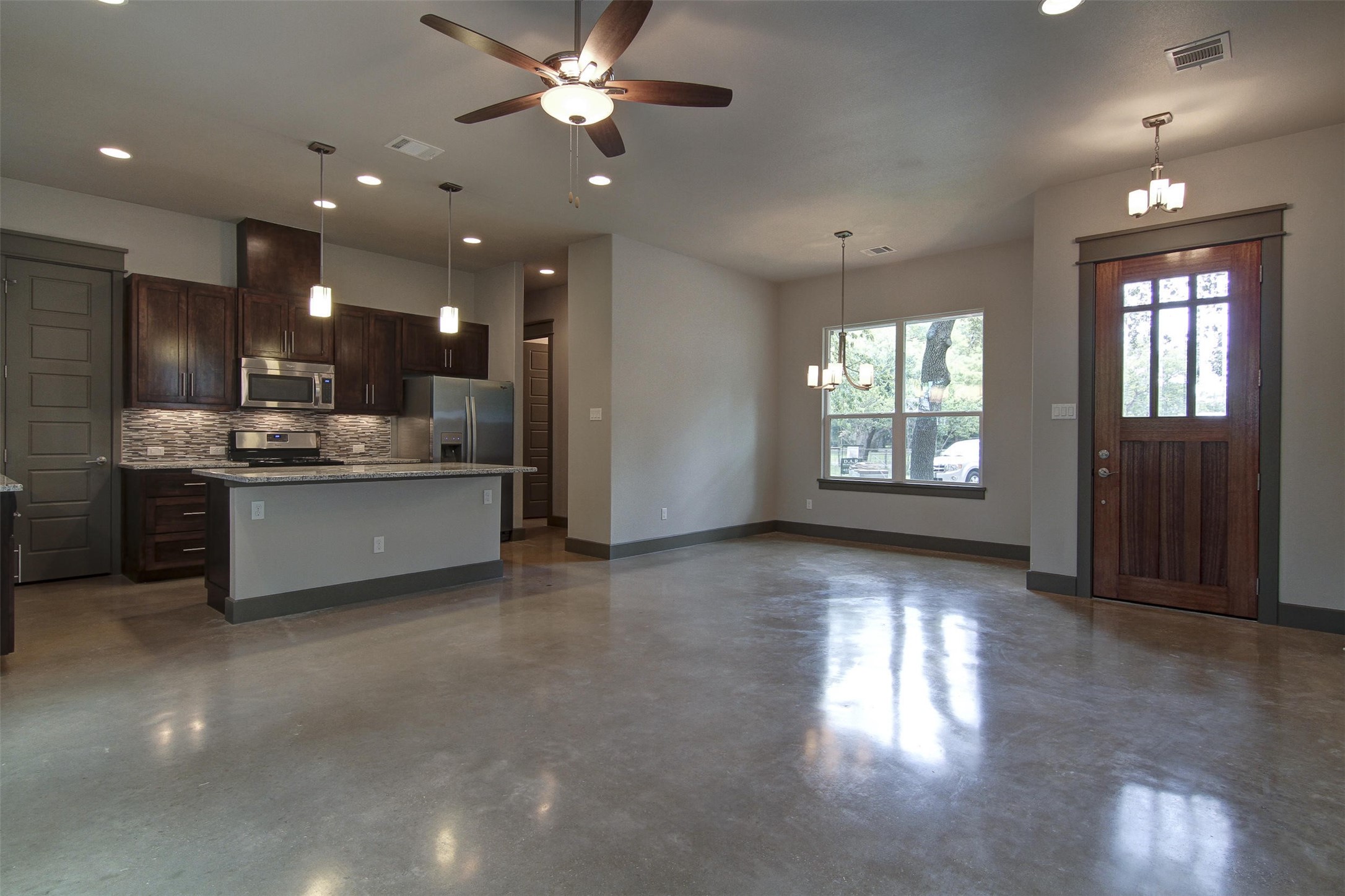 923 East 37th Street Austin, TX 78705 - Photo 7 of 36 a view of a kitchen with a sink and a window