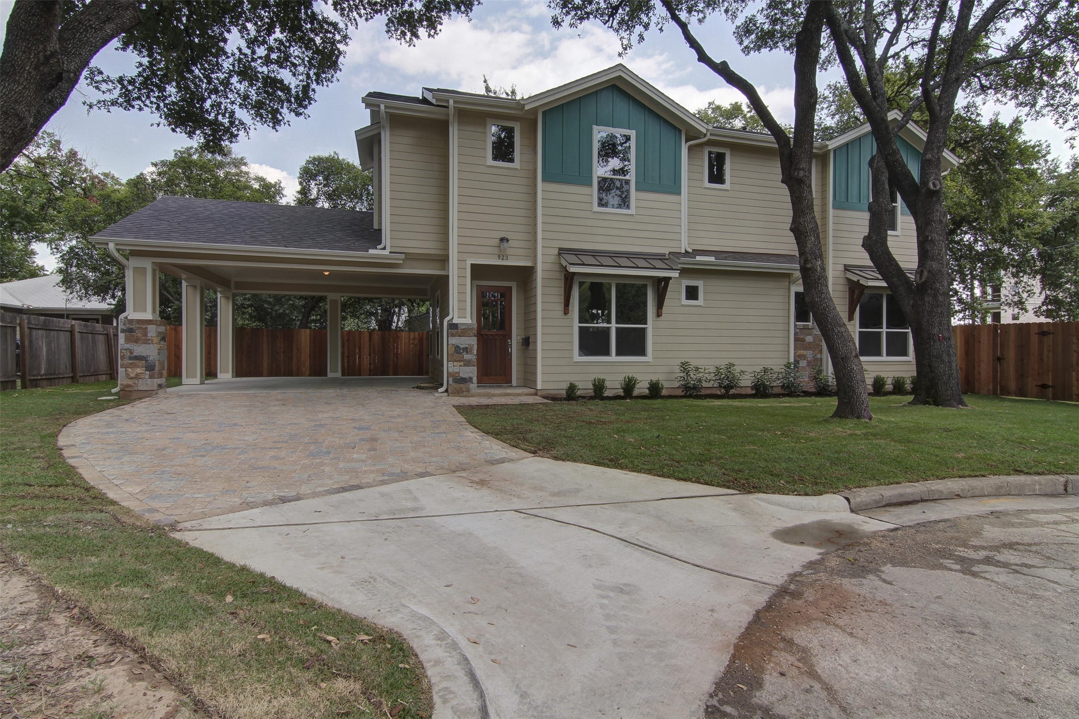 923 East 37th Street Austin, TX 78705 - Photo 10 of 36 a front view of a house with a yard