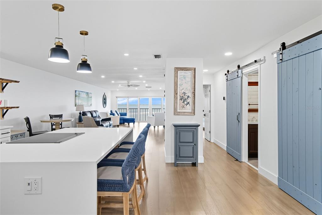 3420 Wild Oak Bay Boulevard, Unit 118 Bradenton, FL 34210 - Photo 12 of 40 a large kitchen with a table and chairs