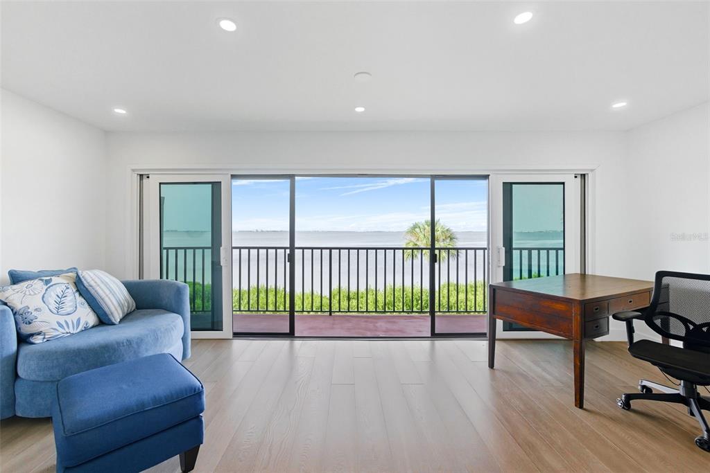 3420 Wild Oak Bay Boulevard, Unit 118 Bradenton, FL 34210 - Photo 20 of 40 a view of livingroom with furniture and wooden floor