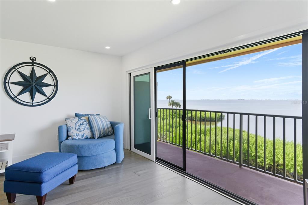 3420 Wild Oak Bay Boulevard, Unit 118 Bradenton, FL 34210 - Photo 21 of 40 a living room with furniture