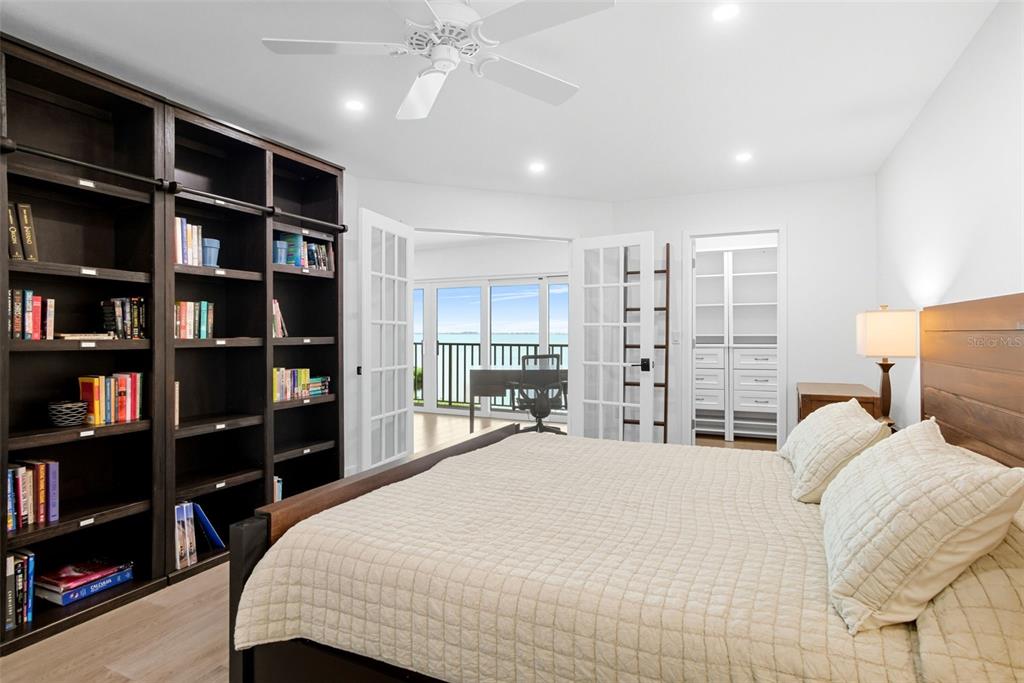 3420 Wild Oak Bay Boulevard, Unit 118 Bradenton, FL 34210 - Photo 25 of 40 a large bedroom with bed