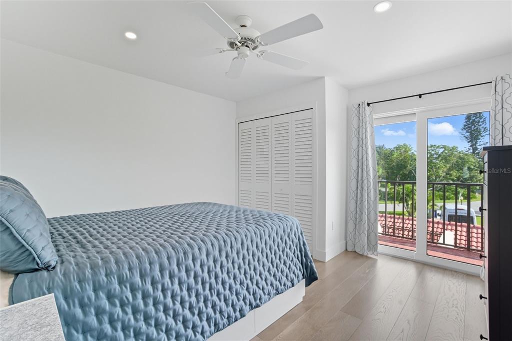 3420 Wild Oak Bay Boulevard, Unit 118 Bradenton, FL 34210 - Photo 29 of 40 a view of bedroom with window and balcony