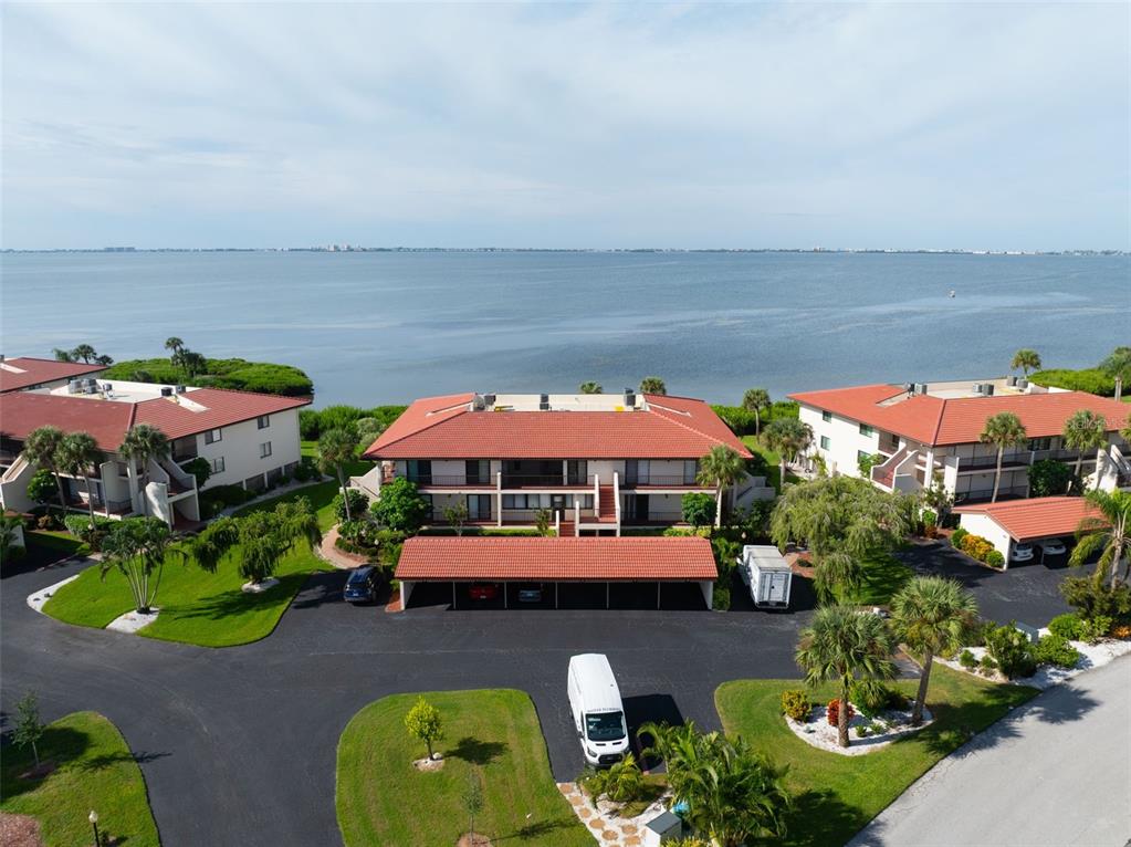 3420 Wild Oak Bay Boulevard, Unit 118 Bradenton, FL 34210 - Photo 35 of 40 an aerial view of a house with yard swimming pool and outdoor seating