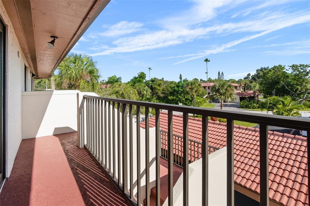 3420 Wild Oak Bay Boulevard, Unit 118 Bradenton, FL 34210 - Photo 39 of 40 a balcony with street view