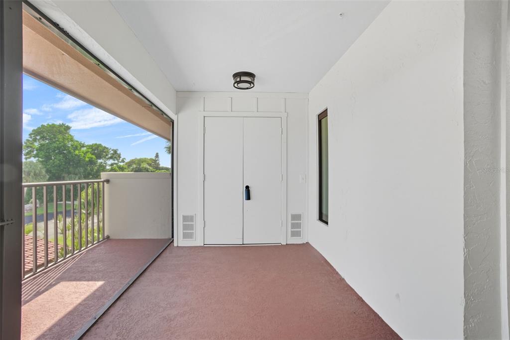 3420 Wild Oak Bay Boulevard, Unit 118 Bradenton, FL 34210 - Photo 40 of 40 a view of a big room with windows