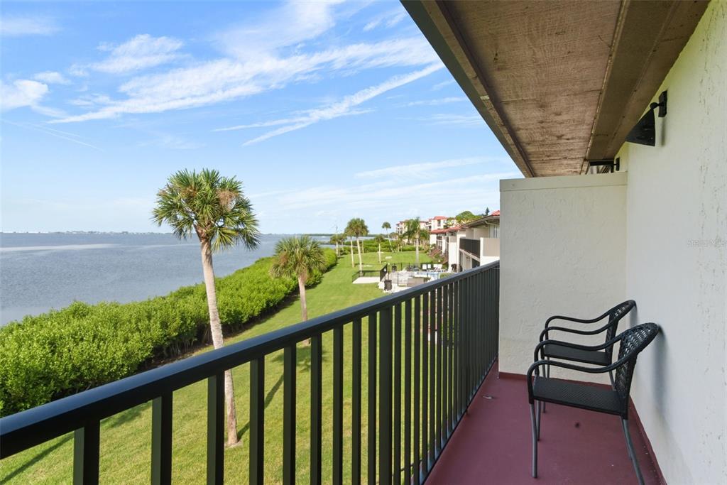 3420 Wild Oak Bay Boulevard, Unit 118 Bradenton, FL 34210 - Photo 5 of 40 a view of a two chair in the balcony