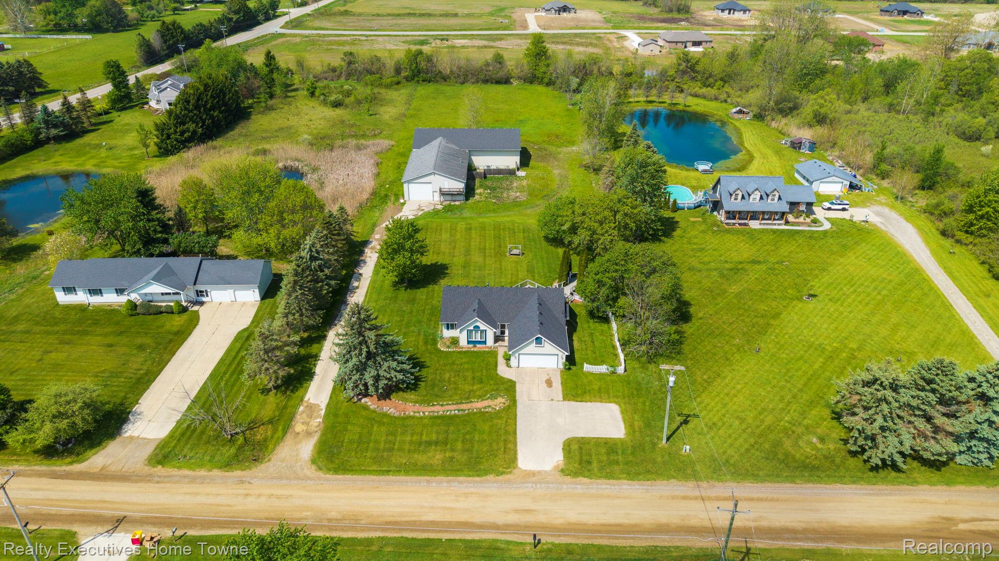 1041 Mackie Road Almont, MI 48003 - Photo 8 of 56 Bird's eye view of a nearby body of water