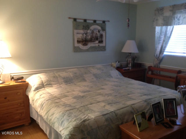 2149 Cutler Street Simi Valley, CA 93065 - Photo 6 of 11 a bed sitting in a bedroom next to a window