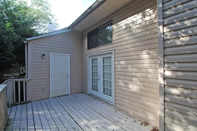 a view of a house with a deck