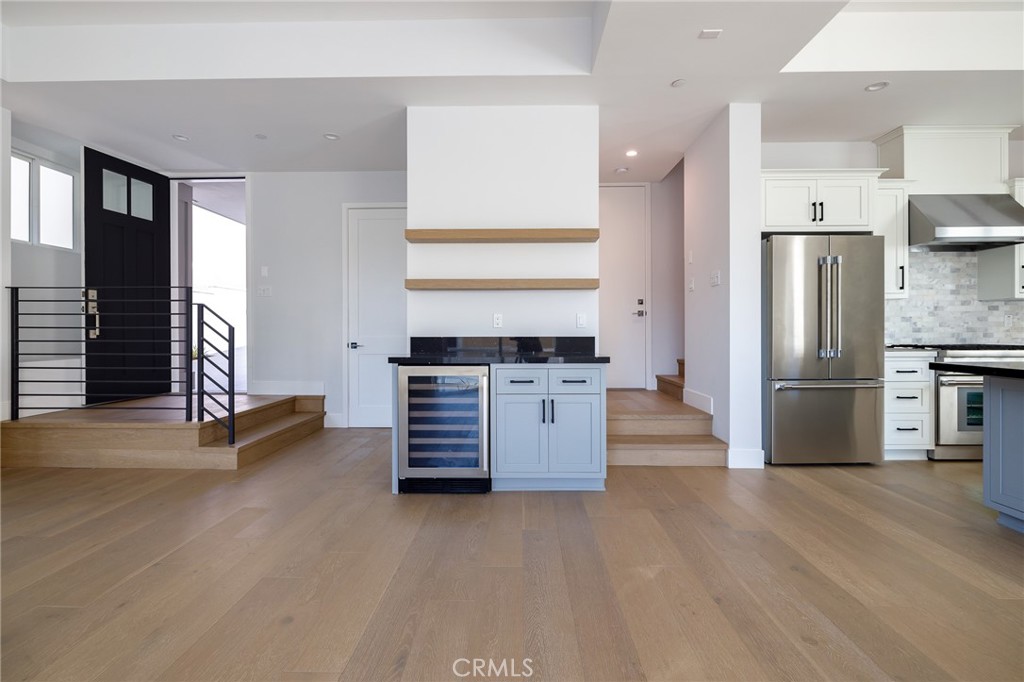 2016 Clark Lane, Unit B Redondo Beach, CA 90278 - Photo 7 of 31 a kitchen with kitchen island a counter top space and stainless steel appliances