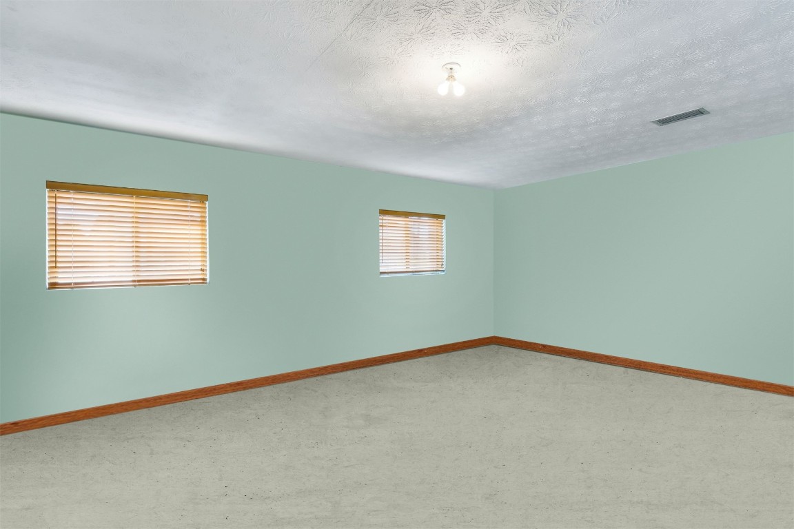 96111 Pirates Bluff Road Yulee, FL 32097 - Photo 32 of 52 an empty room with a window