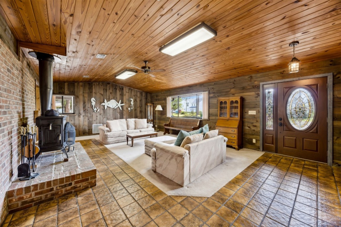96111 Pirates Bluff Road Yulee, FL 32097 - Photo 5 of 52 a living room with furniture a clock on wall and a clock