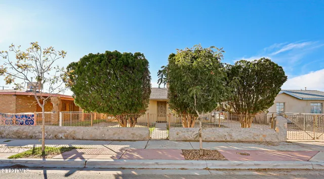 front view of a house with a street