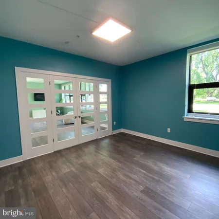 a view of outdoor space with swimming pool and furniture