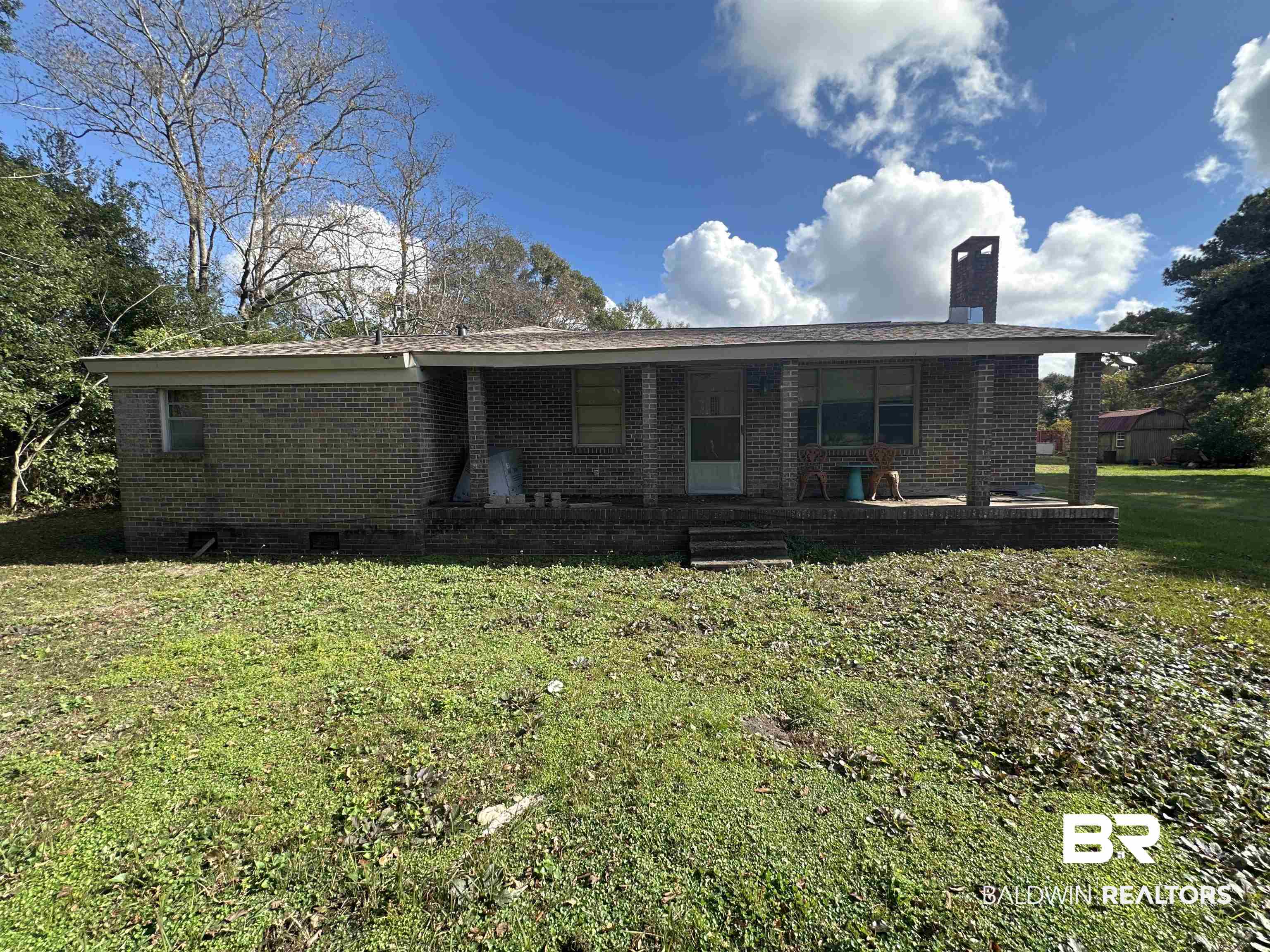 9520 C Four Mile Road Irvington, AL 36544 - Photo 28 of 32 Back of house with a yard