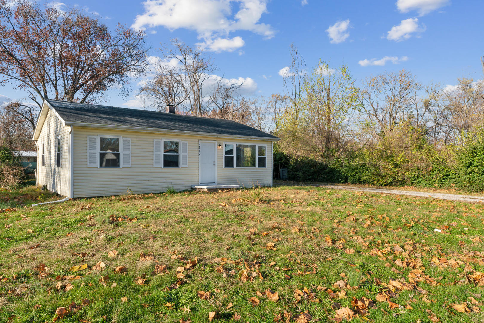 2042 Sandy Ridge Road Cahokia, IL 62206 - Photo 2 of 21 a view of a house with backyard and garden