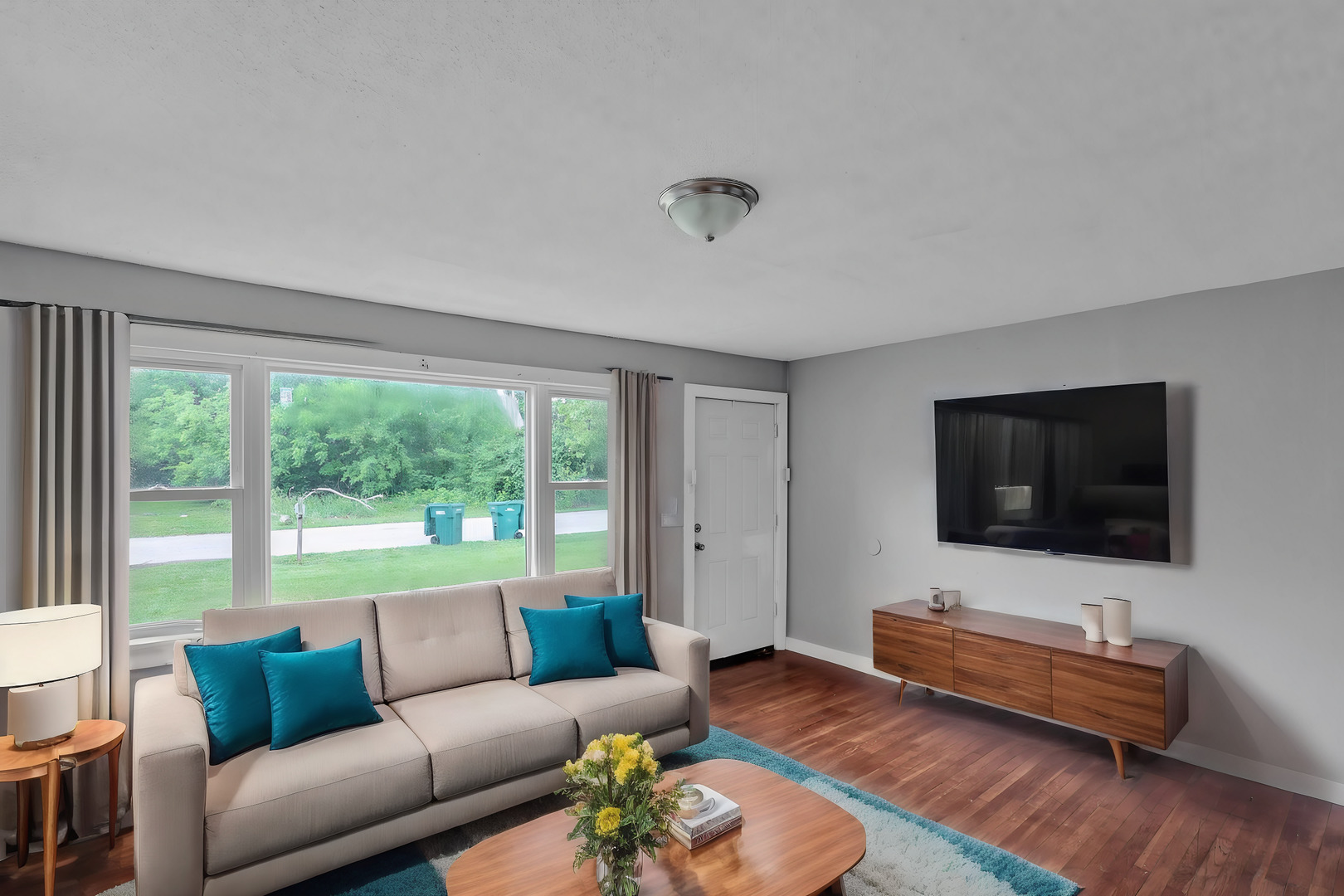 2042 Sandy Ridge Road Cahokia, IL 62206 - Photo 4 of 21 a living room with furniture and a flat screen tv