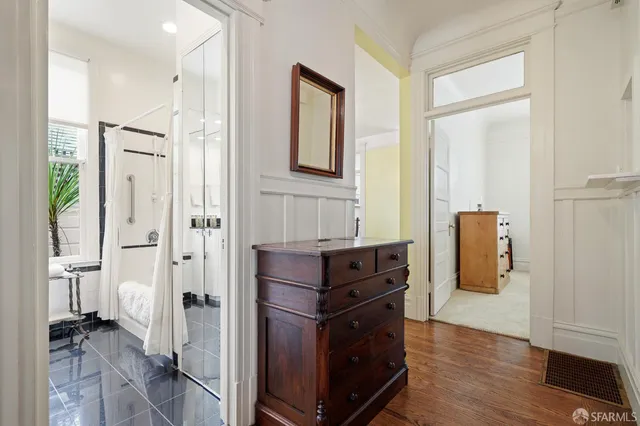 a room with furniture and wooden floor