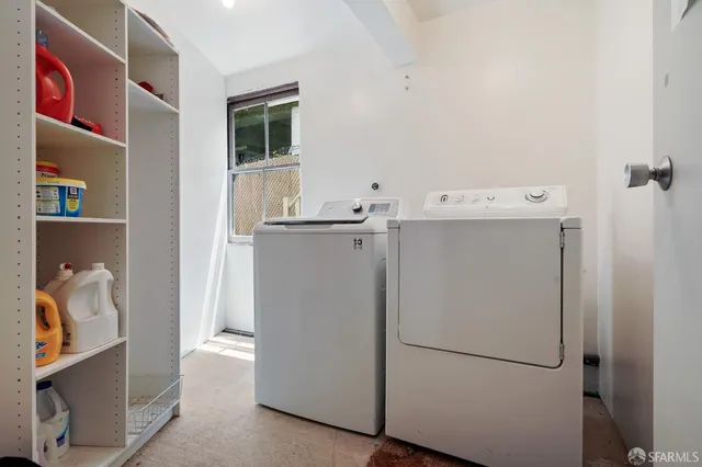 a utility room with dryer and washer