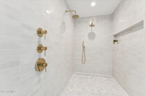 a view of bathroom with dual sinks