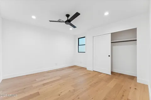a bathroom with a sink and vanity