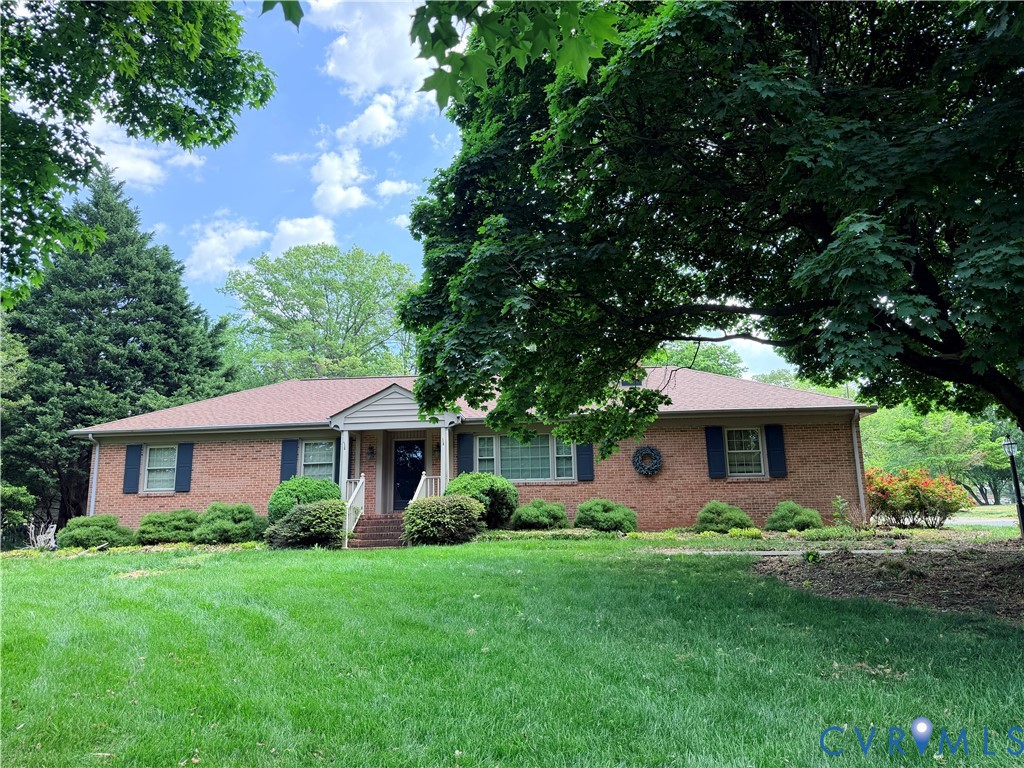 5970 Springfield Road Glen Allen, VA 23060 - Photo 1 of 17 a front view of house with yard and green space