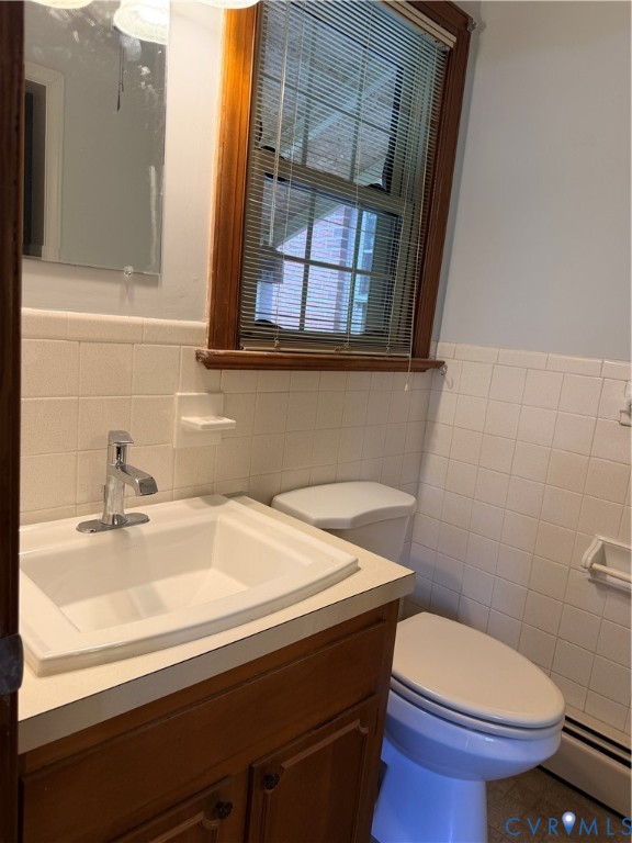 5970 Springfield Road Glen Allen, VA 23060 - Photo 14 of 17 a bathroom with a sink and a toilet