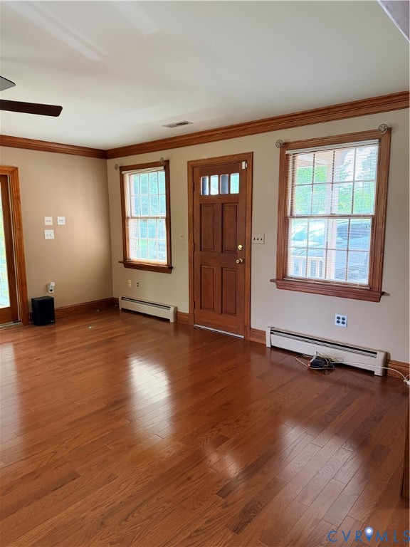 5970 Springfield Road Glen Allen, VA 23060 - Photo 7 of 17 a view of an empty room with wooden floor and a window