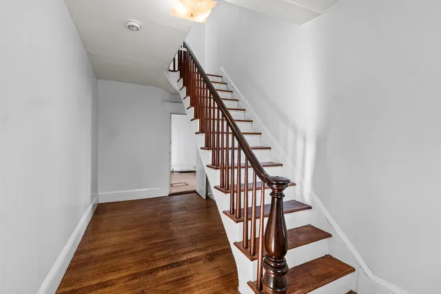 a view of entryway with wooden floor
