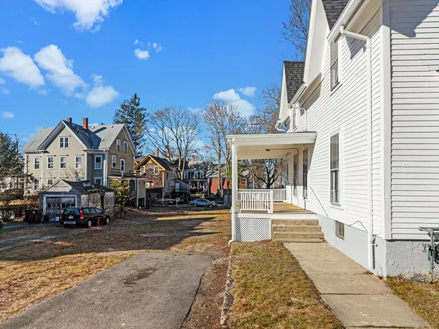 a view of a building with a street