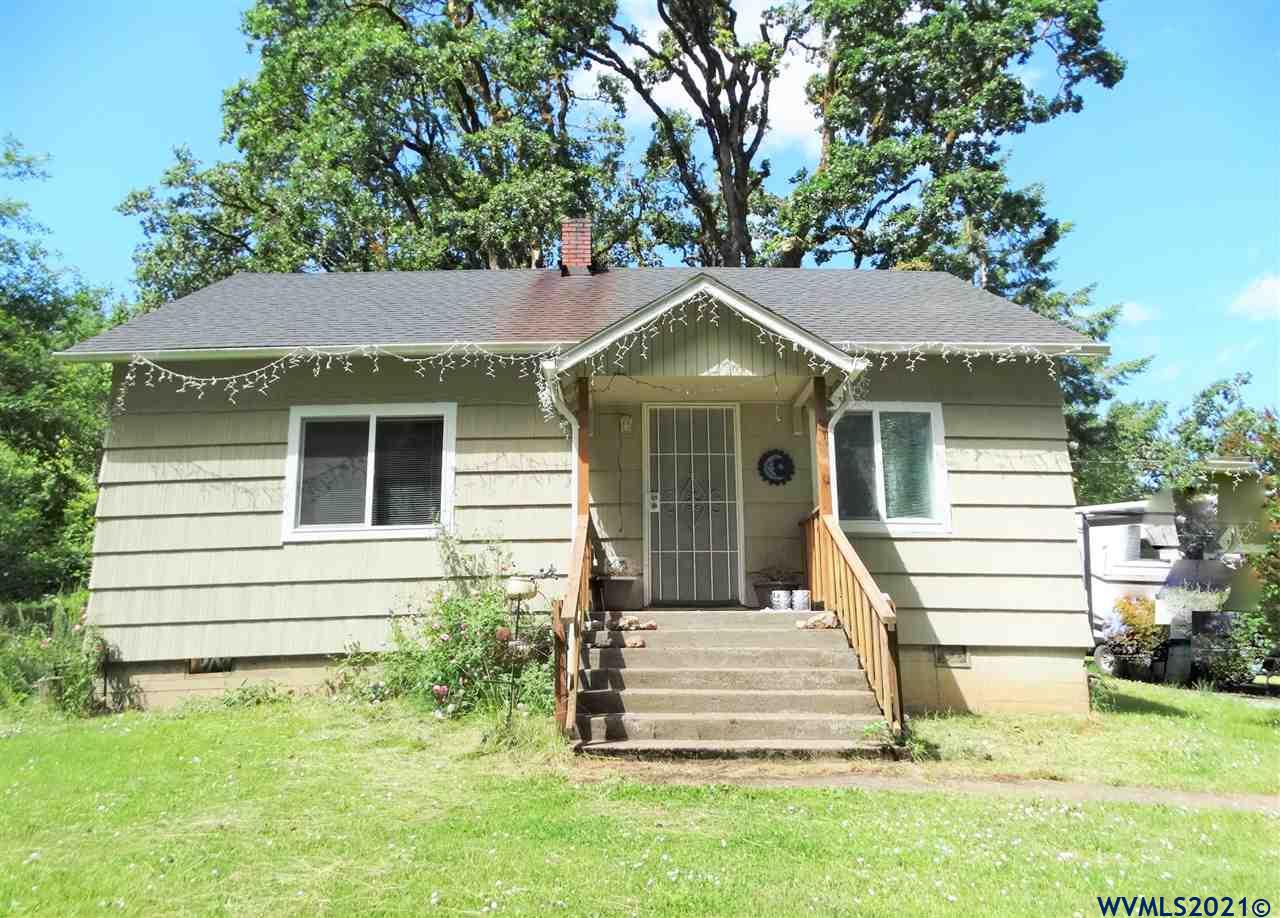 12615 Fishback Road Monmouth, OR 97361 - Photo 1 of 21 a view of a house with a yard