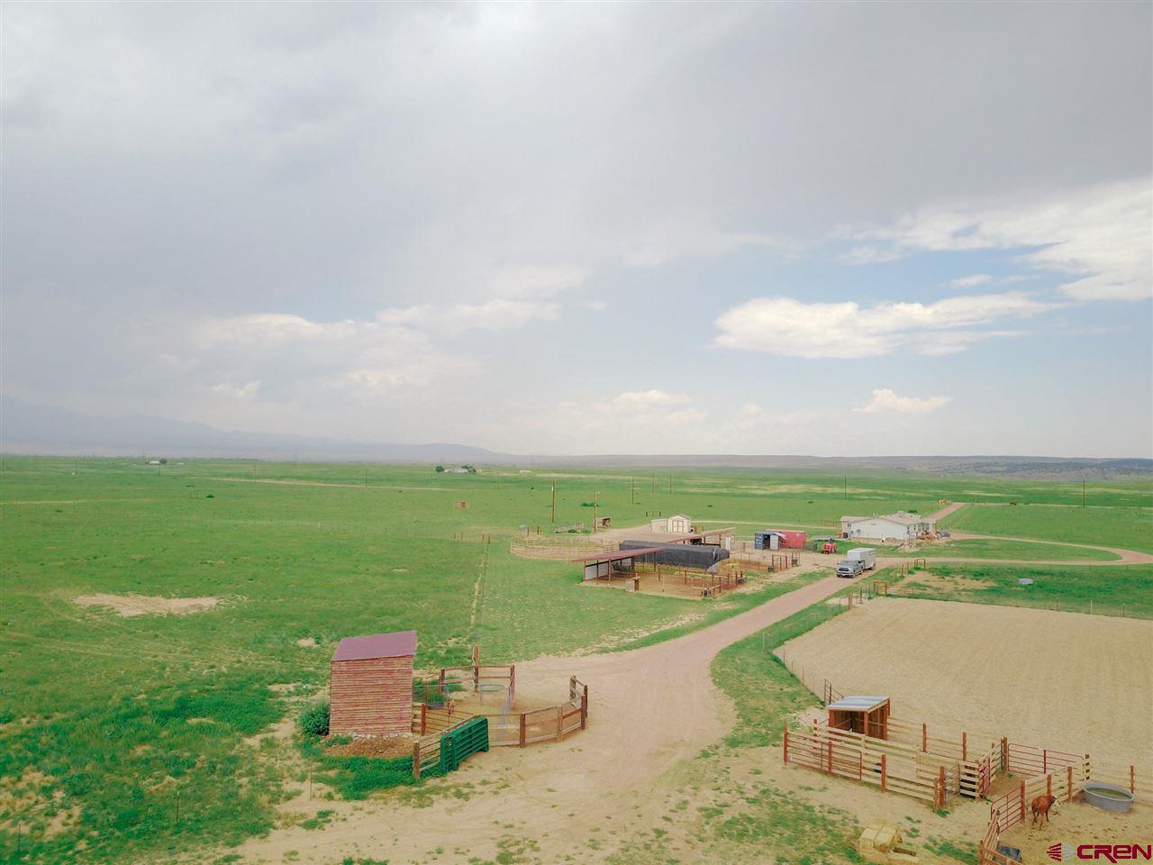 3101 County Road 110 Rye, CO 81069 - Photo 15 of 29 a view of a lake with a big yard