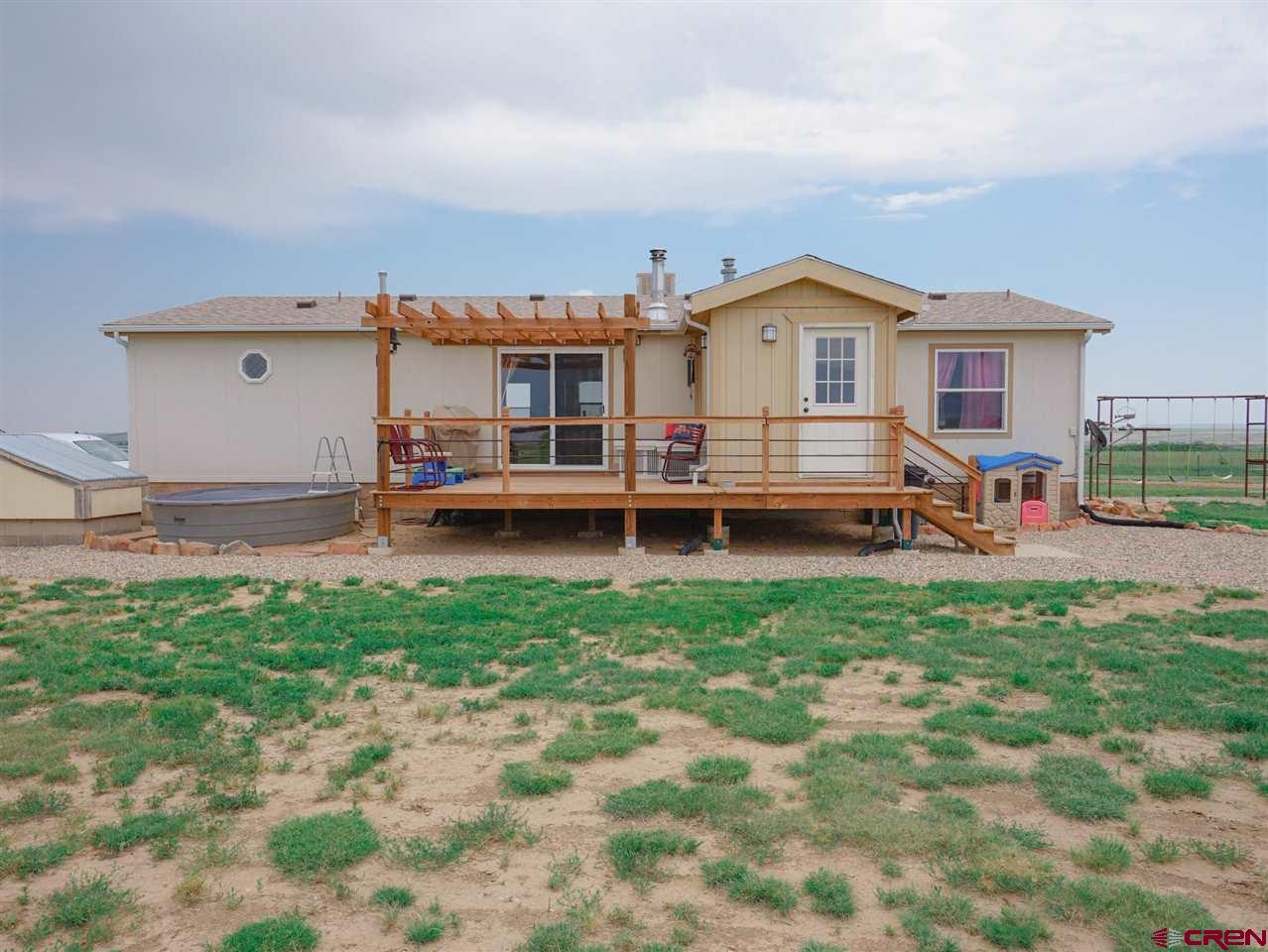 3101 County Road 110 Rye, CO 81069 - Photo 5 of 29 a house view with a garden space