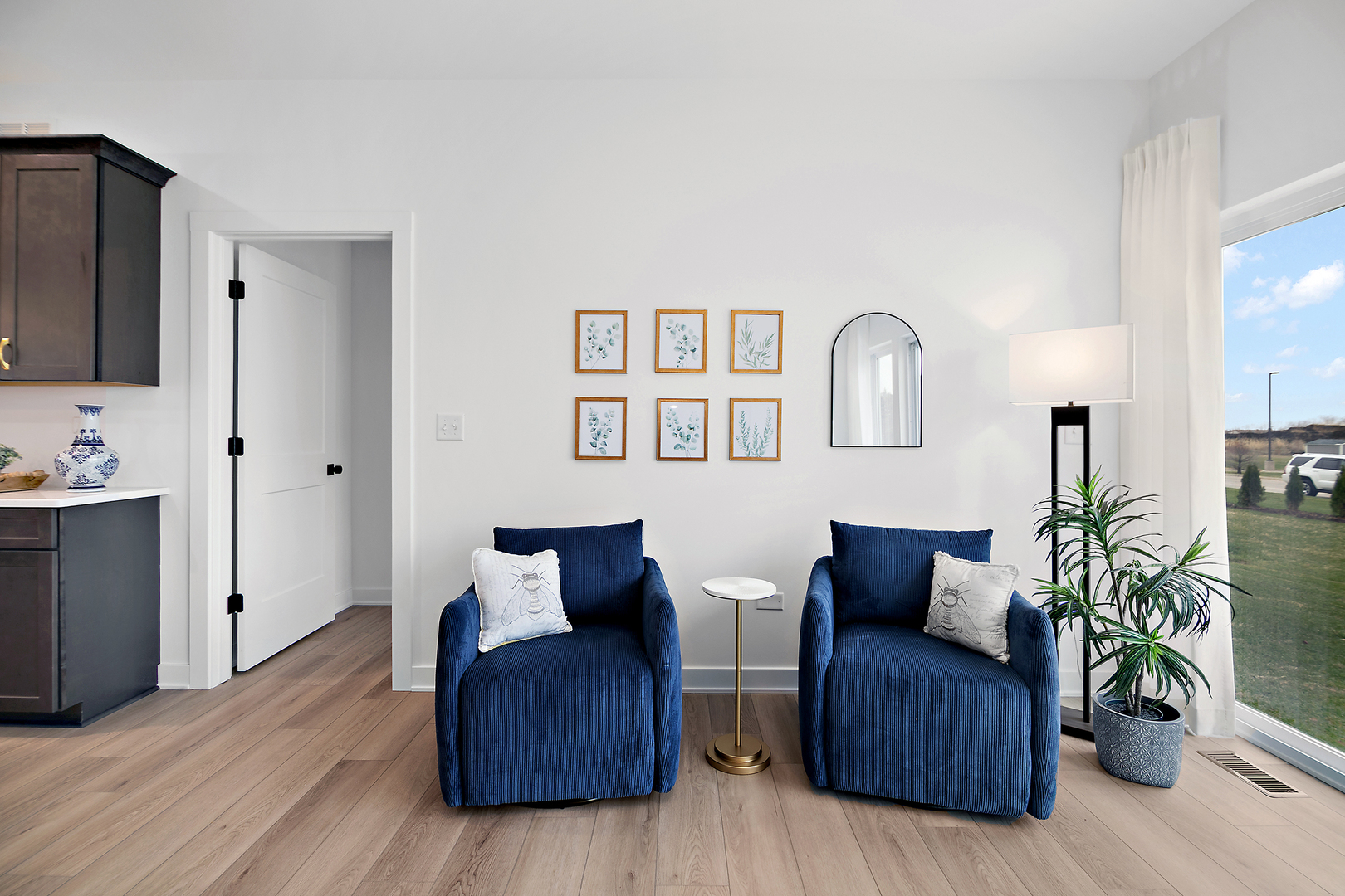 2050 Isabella Lane Minooka, IL 60447 - Photo 19 of 32 a living room with furniture and a potted plant