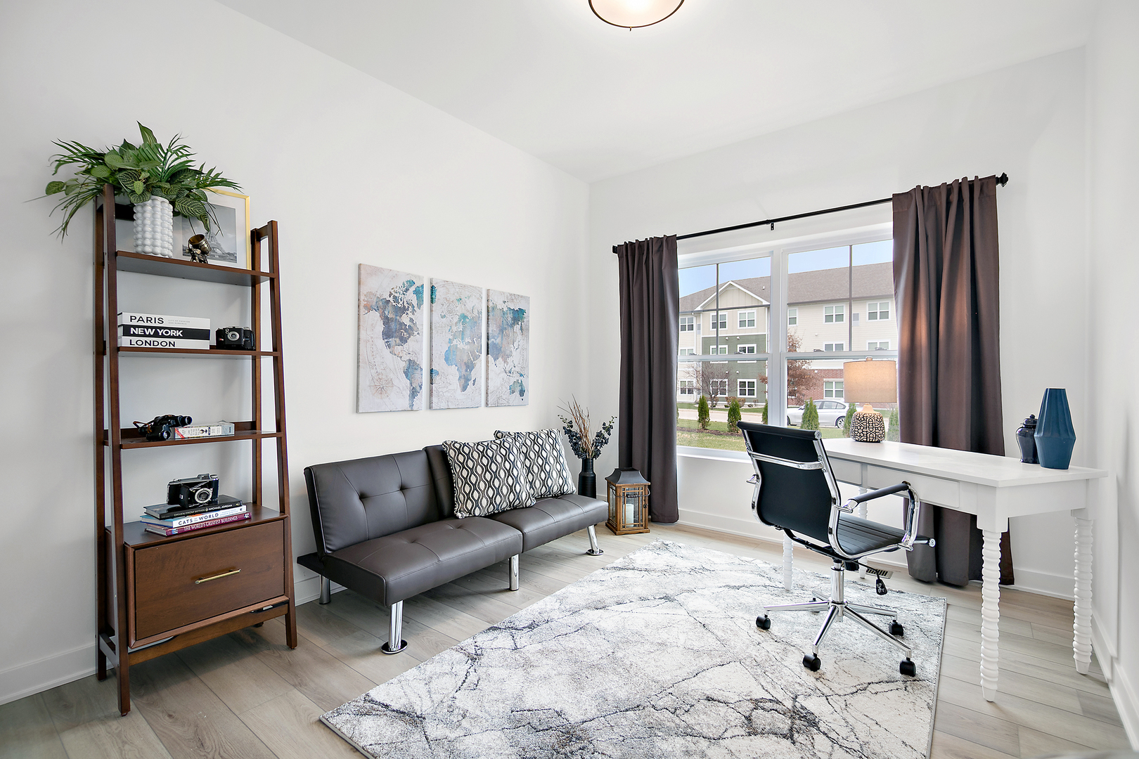 2050 Isabella Lane Minooka, IL 60447 - Photo 22 of 32 a living room with furniture lamp and window