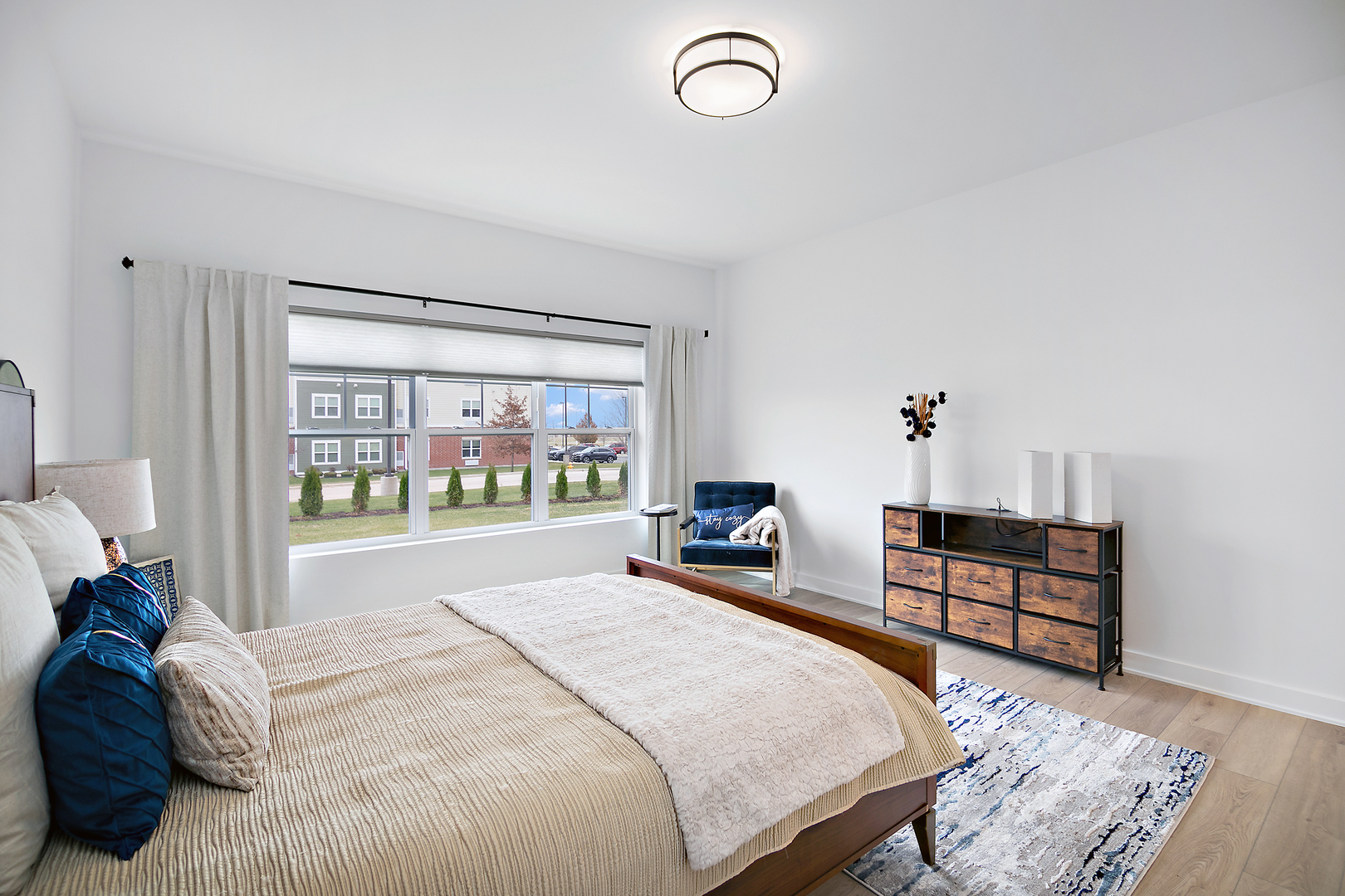 2050 Isabella Lane Minooka, IL 60447 - Photo 26 of 32 a spacious bedroom with a bed and a large window