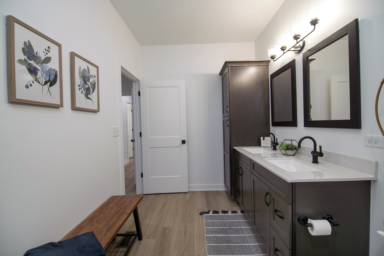 2050 Isabella Lane Minooka, IL 60447 - Photo 31 of 32 a bathroom with a sink and a mirror