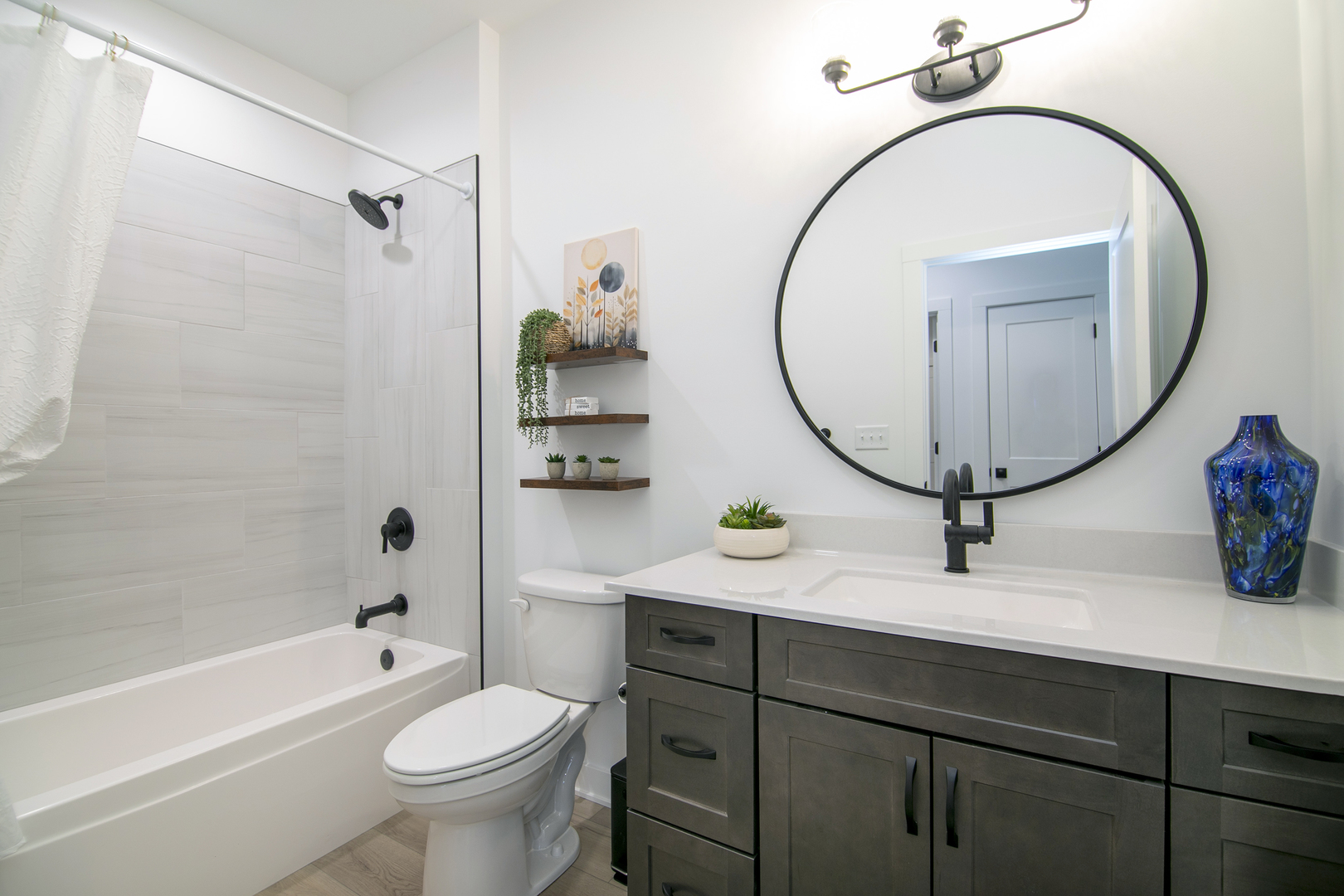 2050 Isabella Lane Minooka, IL 60447 - Photo 8 of 32 a bathroom with a toilet a sink and a mirror