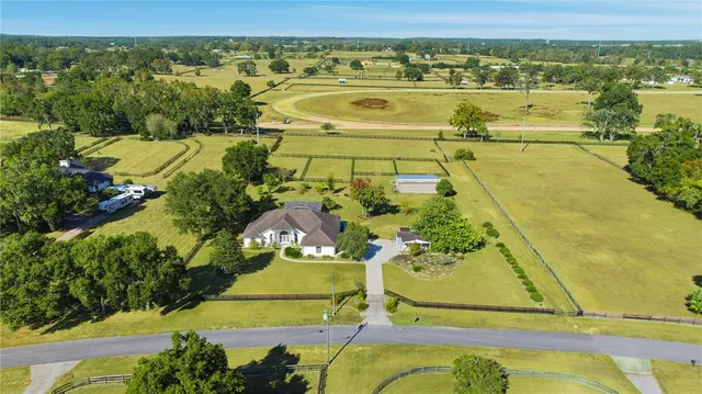 a view of a swimming pool with a lake view