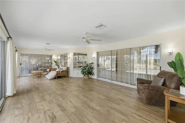 a view of a livingroom with wooden floor