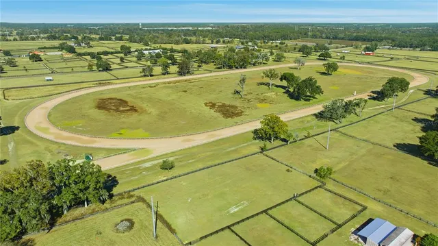 a view of a swimming pool and an outdoor space