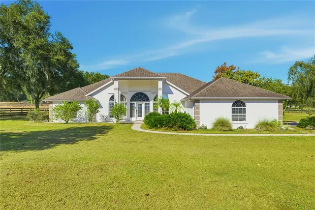 a front view of house with yard