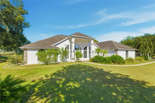 a house view with a garden space