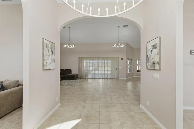 a view of livingroom with hardwood floor and ceiling fan